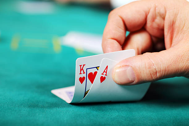 Live-dealer studio interior with multiple camera angles showing blackjack and roulette tables